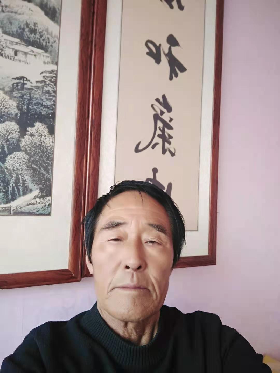 张首德